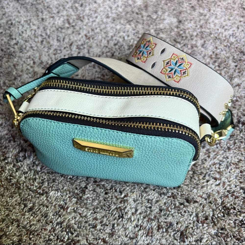 NWOT Steve Madden double zip bag.Comes with 2 shoulder straps.